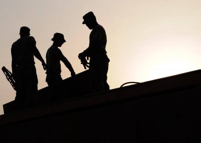 workers-construction-site-hardhats-38293